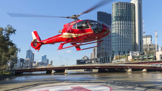 Red Helicopter Flying Over Melbourne